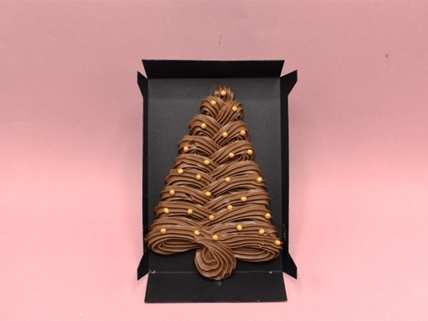 Kleine Kerstboom handgespoten roomchoco.